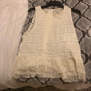 White ruffled blouse